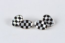 A PAIR OF SILVER, ONYX AND MOTHER-OF-PEARL CHEQUER CUFFLINKS.