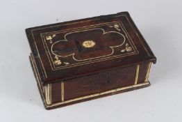 AN 18TH / 19TH CENTURY PRIMITIVE MAHOGANY AND BONE INLAID RECTANGULAR BOX, with hinged cover and