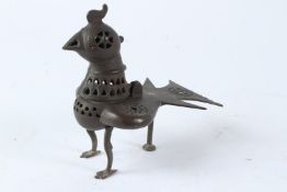 AN UNUSUAL 19TH CENTURY EARLY PERSIAN STYLE INDIA BIRD SHAPED BRASS INCENSE BURNER. 15cms high.