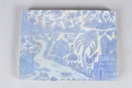 A FINE LARGE ISLAMIC, POSSIBLY DAMASCUS, GLAZED POTTERY TILE depicting a mosque and a church in a