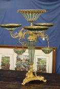 A HIGHLY ORNATE ORMOLU AND BOHEMIAN GLASS CENTREPIECE, the central column with circular cut glass,