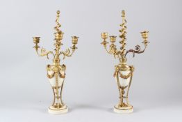 A PAIR OF 19TH CENTURY ORMOLU AND MARBLE THREE LIGHT CANDELABRA / CASSOLETTES of classical form with