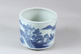 A LARGE CHINESE BLUE AND WHITE BRUSH POT OR BITONG, painted with figures in a mountainous river