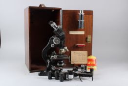 A W. WATSON & SONS LTD BINOCULAR MICROSCOPE, No. 86180, with accessories, in a mahogany case.
