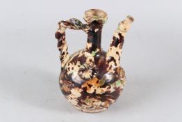 A 19TH CENTURY OTTOMAN TURKISH CHANAKKALE POTTERY EWER. 22ins high.