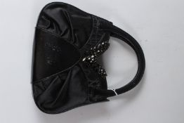 A GIUSEPPE ZANOTTI LADIES BLACK LEATHER AND SATIN HANDBAG.
