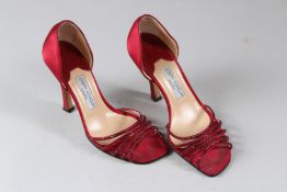 JOSEPH AZAGURY, A PAIR OF LADIES RED SATIN HIGH HEEL SHOES, size 38.