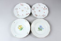 FOUR HEREND PORCELAIN DISHES, each with basketweave borders and floral decoration. 20cms and 21cms
