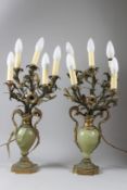 A PAIR OF ONYX AND ORMOLU TWIN-HANDLED URN SHAPED TABLE LAMPS, each with five naturalistic style