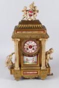 A GILDED SPELTER MANTLE CLOCK, of classical form, with eight day movement, the case set with