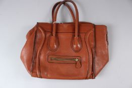 CELINE, PARIS, A LADIES LARGE BROWN LEATHER HANDBAG.