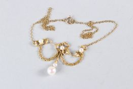 AN 18CT YELLOW GOLD AND PEARL BELLE EPOQUE PENDANT AND CHAIN.
