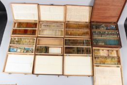 A COLLECTION OF MICROSCOPE SLIDES, boxed.