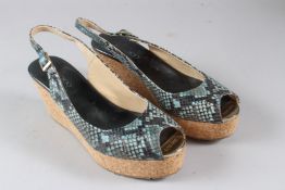 JIMMY CHOO, A PAIR OF LADIES FAUX SNAKESKIN SHOES with cork soles, size 38.5.