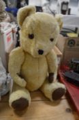 A Deans gold plush teddy bear.