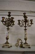A pair of ormolu and alabaster candelabra (faults).