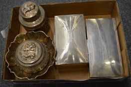 Two silver cigarette boxes, a pedestal bowl, Burmese sterling silver embossed bowl and cover and