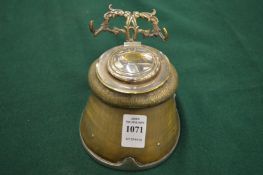 A horse hoof inkwell with plated mounts.
