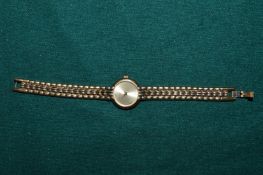 A ladies gilt metal wristwatch.