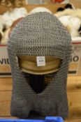 Chain mail head covering.