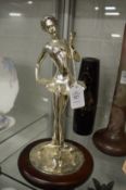A silver plated model of a ballerina.