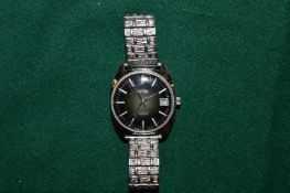 A gentlemans stainless steel wristwatch.