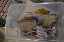 A box of pin badges.