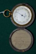 A Negretti & Zambra leather cased pocket barometer.
