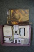 A box of Lord Of The Rings collectables.