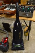 An Electrolux upright vacuum cleaner.