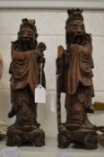 A pair of root wood carvings of Chinese sages.