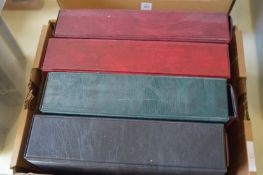 Four albums of cigarette cards.