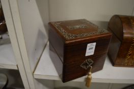 A Victorian mother of pearl inlaid rosewood four division scent bottle box with hinged cover.