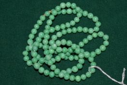 A jade bead necklace.