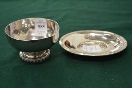 A small hammered silver pedestal bowl and small oval dish.