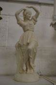 A Parian ware figure of a classical young lady.