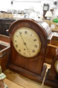 An Edwardian dome topped mahogany mantel clock, the dial signed Frodsham.