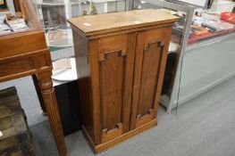 A small walnut cupboard.