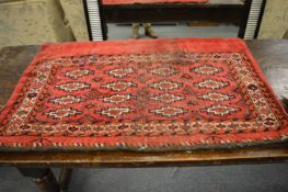 A Persian bokhara style camel bag (moth damage) 118cm x 78cm.