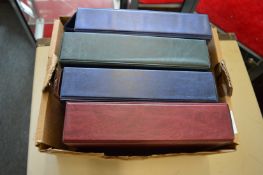 Four albums of cigarette cards.