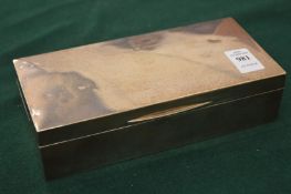 Silver cigarette box.