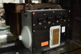 An Evershed & Vignoles Ltd testing device with leather case.