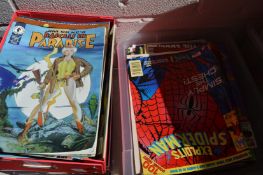 A box of comics and magazines.