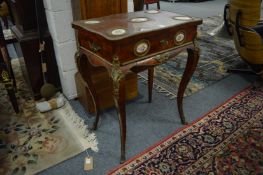 A good 19th century French kingwood work table inset with porcelain panels and ormolu mounts, the