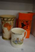 A Charlotte Rhead trumpet shaped vase, Bunnykins tankard and a Carlton ware jug.