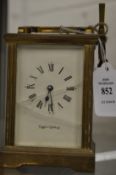 A Mappin & Webb brass carriage clock (front glass broken).