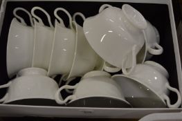 Quantity of white porcelain soup bowls.