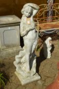 A large painted reconstituted stone garden ornament modelled as a classical lady.