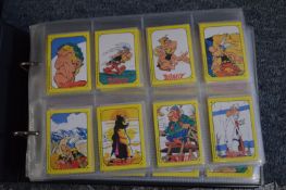 Four albums of cigarette cards.