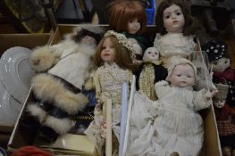 A collection of modern porcelain headed and other dolls.